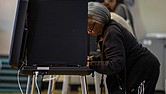 Joyce Banks casts her vote on Tuesday, Nov. 5 at John B. Cary Elementary School in the Byrd Park neighborhood.