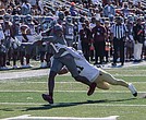 Reginald Vick Jr. hauls in a reception from Mark Wright as Virginia Union University crushes Bluefield State University 91-0, tying a 108-year-old record Saturday, Nov. 2, at Hovey Stadium.