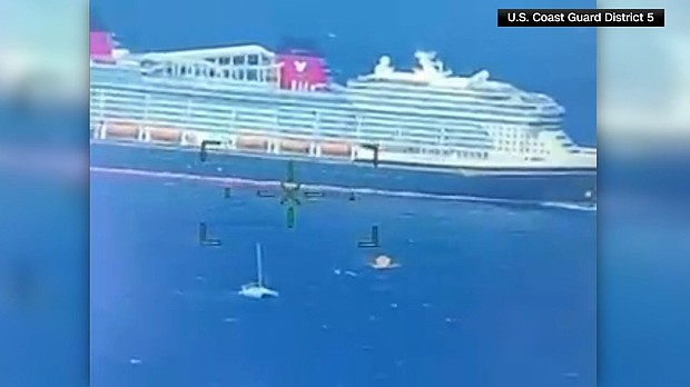 A Disney cruise ship helped rescue four boaters that were left stranded off the coast of Bermuda.
Mandatory Credit:	US coast guard via CNN Newsource