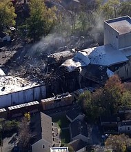A building is damaged from a possible explosion in Louisville, Kentucky, on November 12.
Mandatory Credit:	WLKY via CNN Newsource