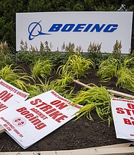 Picket signs outside the Boeing factory in Renton, Washington. The eight-week strike at the company ended when workers voted to accept a new four-year contract at Boeing on November 4.
Mandatory Credit:	M. Scott Brauer/Bloomberg/Getty Images via CNN Newsource