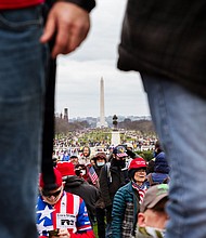 The Washington Monument is seen in the background as pro-Trump protesters break through barriers onto the grounds of the Capitol on January 6, 2021 in Washington, DC.
Mandatory Credit:	Jon Cherry/Getty Images via CNN Newsource