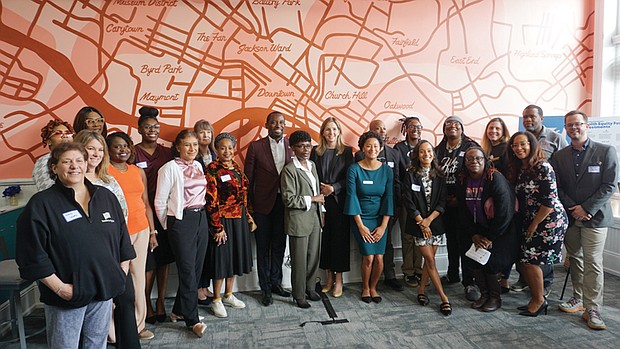 Leaders from Health Equity Fund partner groups stand with Mayor Levar M. Stoney, City Council members Cynthia
Newbille and Katherine Jordan, Richmond and Henrico Health Districts Director Elaine Perry, and Health Equity Fund Program Officer Shaleetta Drawbaugh at the St. Luke Legacy Center.