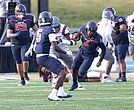 Virginia State University quarterback Romelo Williams calls his own number as the team defeated the Virginia Union Panthers 35-28 on Saturday, Nov. 9, in Ettrick.