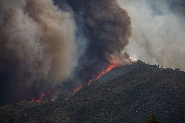 ire burned through the foothills of the San Bernardino Mountains in California, forcing evacuations for neighborhoods in early September.
Mandatory Credit:	Apu Gomes/Getty Images via CNN Newsource