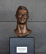 A bust of soccer star Cristiano Ronaldo at Madeira Airport that was unveiled in 2017 is often referenced when it comes to controversial sporting sculptures.
Mandatory Credit:	Octavio Passos/Getty Images via CNN Newsource