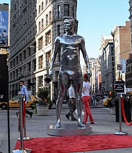 David Beckham's statue on the streets of New York City.
Mandatory Credit:	Anna Webber/Getty Images via CNN Newsource