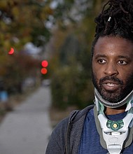 This still from video shows Davis Moturi, who suffered a gunshot to the neck as well as a concussion and fractured ribs, according to authorities.
Mandatory Credit:	CNN via CNN Newsource