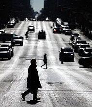 Jaywalking is now legal in New York City, but tourists should still proceed with caution and follow crossing signals.
Mandatory Credit:	Charly Triballeau/AFP/Getty Images via CNN Newsource
