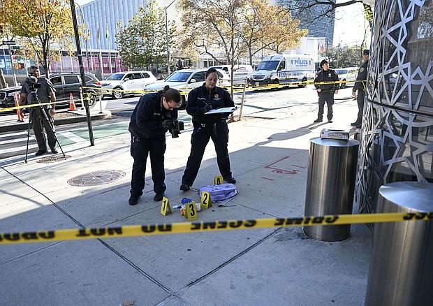 Officers of New York Police Department (NYPD) investigate the site where the suspect of 3 knife attacks that killed 2 was captured and taken into custody at East 46th Street and First Avenue.
Mandatory Credit:	Faith Aktas/Anadolu/Getty Images via CNN Newsource