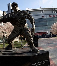 Walter Johnson's statue resides outside Nationals Park.
Mandatory Credit:	Win McNamee/Getty Images via CNN Newsource