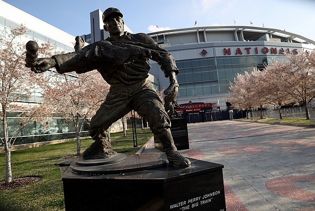 Walter Johnson's statue resides outside Nationals Park.
Mandatory Credit:	Win McNamee/Getty Images via CNN Newsource