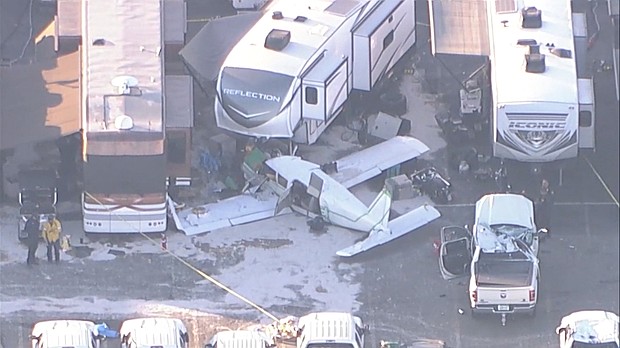 Four people were injured when a single-engine plane crashed Sunday morning at the In-N-Out Burger Pomona Dragstrip.
Mandatory Credit:	KABC via CNN Newsource