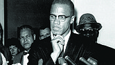 Malcolm X speaks to reporters, May 16, 1963, in Washington, D.C.