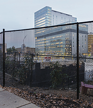 An empty lot at 500 N. 10th St., the site of the former Richmond Public Safety Building, remains after a scrapped multimillion-dollar redevelopment project. City officials are seeking mediation with VCU Health over the failed development and associated financial obligations.