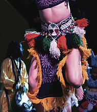 Imani Bell performs with the Elegba Folklore Drummers at last year’s Capital City Kwanzaa Festival.