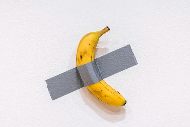 Italian artist Maurizio Cattelan's "Comedian," a conceptual artwork comprising a banana stuck to a wall with duct tape, sold on November 20 for $6.24 million at a Sotheby's auction in New York.
Mandatory Credit:	Eduardo Munoz Alvarez/AP via CNN Newsource
