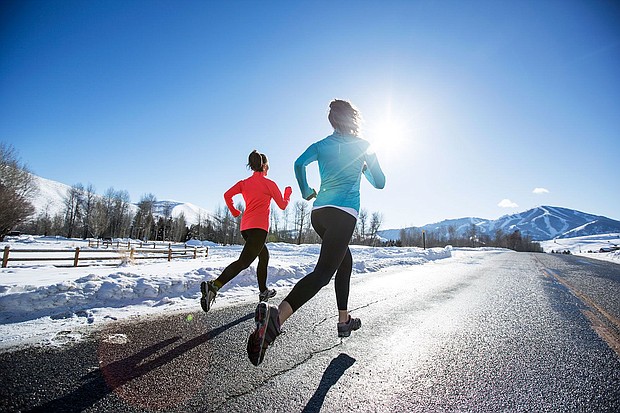 Make sure to dress appropriately if you're heading outside in winter to exercise.
Mandatory Credit:	Jordan Siemens/Stone RF/Getty Images/File via CNN Newsource