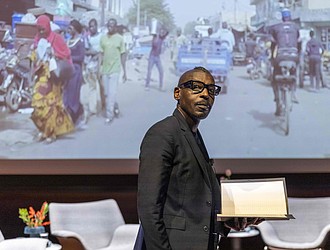 Architect Mario Gooden speaks during the Nov. 15 panel discussion, "Black Architecture: Critical Perspectives on Black Spatial Thinking," at the ICA at VCU. The event, part of the "Dear Mazie" exhibition, explored the legacy and future of Black architecture.  Julianne Tripp Hillian/Richmond Free Press