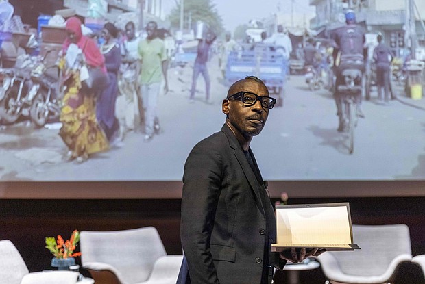 Architect Mario Gooden speaks during the Nov. 15 panel discussion, "Black Architecture: Critical Perspectives on Black Spatial Thinking," at the ICA at VCU. The event, part of the "Dear Mazie" exhibition, explored the legacy and future of Black architecture.  Julianne Tripp Hillian/Richmond Free Press