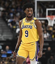 Bronny James (9) looks on against the Golden State Warriors during a preseason game on October 15, in Las Vegas, Nevada. Charles Barkley has criticized the Los Angeles Lakers over their handling of Bronny this season.
Mandatory Credit:	Candice Ward/USA TODAY Sports/Reuters via CNN Newsource