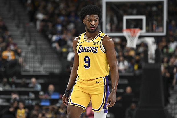 Bronny James (9) looks on against the Golden State Warriors during a preseason game on October 15, in Las Vegas, Nevada. Charles Barkley has criticized the Los Angeles Lakers over their handling of Bronny this season.
Mandatory Credit:	Candice Ward/USA TODAY Sports/Reuters via CNN Newsource