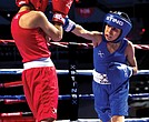 A young fighter lands a sharp jab during the 2023 USA Boxing National Championships at the Cajundome in Louisiana. The event showcased top young talent and Olympic hopefuls, setting the stage for the 2024 championships, which will take place Dec. 16-21 in Richmond.