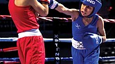 A young fighter lands a sharp jab during the 2023 USA Boxing National Championships at the Cajundome in Louisiana. The event showcased top young talent and Olympic hopefuls, setting the stage for the 2024 championships, which will take place Dec. 16-21 in Richmond.