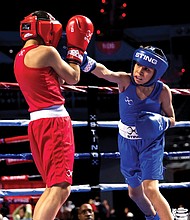 A young fighter lands a sharp jab during the 2023 USA Boxing National Championships at the Cajundome in Louisiana. The event showcased top young talent and Olympic hopefuls, setting the stage for the 2024 championships, which will take place Dec. 16-21 in Richmond.