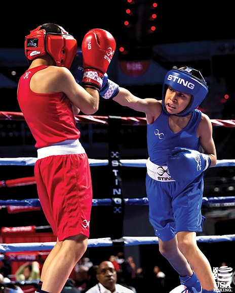 A young fighter lands a sharp jab during the 2023 USA Boxing National Championships at the Cajundome in Louisiana. The event showcased top young talent and Olympic hopefuls, setting the stage for the 2024 championships, which will take place Dec. 16-21 in Richmond.