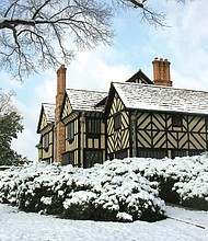 Agecroft Hall, covered in snow, will host its free Yuletides open house on Dec. 8 from noon to 5 p.m. The event features holiday crafts, historic tours, and a visit from Father Christmas.