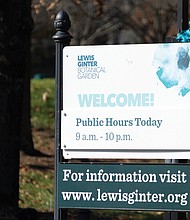 A sign denotes Lewis Ginter Botanical Garden public visiting hours at the entrance on Lakeside Ave last week.