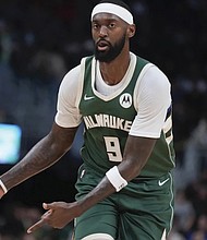 Milwaukee Bucks’ Bobby Portis reacts to his three pointer during the first half of a basketball game Wednesday, Nov. 20, in Milwaukee.