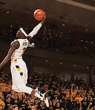 Briante Weber elevates for a dunk during his career at VCU. The university will retire Weber’s No. 2 jersey Dec. 22 at the Siegel Center during a game against William & Mary, recognizing his impact as a standout defender and key player in Rams’ history.