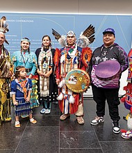 Sam Bearpaw, sisters Aliyah and Aysa Hopkins and their sister Alyssa Micco Hawkins, brothers Scott Sixkiller Sinquah, Sampson Sixkiller Sinquah, and their father Moontee Sinquah, gather for a photo during the Native American Family Day Powwow at the 8th Annual Pocahontas Reframed Film Festival, held Nov. 22-24 at the Virginia Museum of History & Culture and the Virginia Museum of Fine Arts.