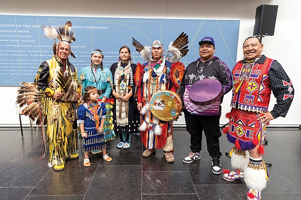 Sam Bearpaw, sisters Aliyah and Aysa Hopkins and their sister Alyssa Micco Hawkins, brothers Scott Sixkiller Sinquah, Sampson Sixkiller Sinquah, and their father Moontee Sinquah, gather for a photo during the Native American Family Day Powwow at the 8th Annual Pocahontas Reframed Film Festival, held Nov. 22-24 at the Virginia Museum of History & Culture and the Virginia Museum of Fine Arts.