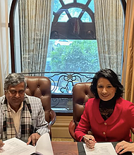 The agreement is signed: D. Dileep Kumar, Indian Nursing Council president and Renu Khator, chancellor of the University of Houston System and president of the University of Houston sign the memorandum of understanding.
