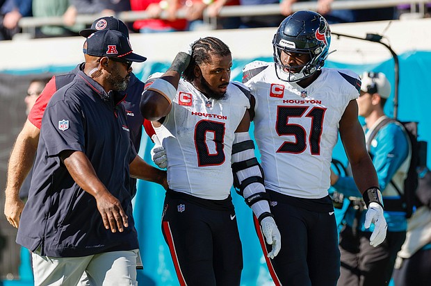 Houston Texans linebacker Azeez Al-Shaair (No. 0) was escorted off the field after being ejected from Sunday's game against the Jacksonville Jaguars
Mandatory Credit:	David Rosenblum/Icon Sportswire/Getty Images via CNN Newsource
