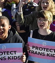 Protesters gathered outside the Kentucky State Capitol building last year to oppose the state's ban on gender-affirming care for minors.
Mandatory Credit:	Timothy D. Easley/AP/File via CNN Newsource
