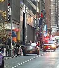 Police work the scene of a shooting, where UnitedHealthcare CEO Brian Thompson was fatally shot Wednesday in New York.
Mandatory Credit:	WABC via CNN Newsource