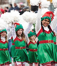 Cheerful dancers dressed as elves spread holiday cheer during last year’s Dominion Energy Christmas Parade. This year’s parade, set for Dec. 7, will feature festive floats, marching bands and the theme “Christmas Wishes.”