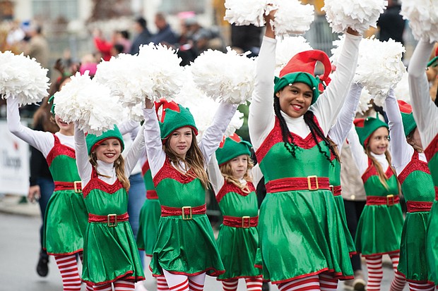 Cheerful dancers dressed as elves spread holiday cheer during last year’s Dominion Energy Christmas Parade. This year’s parade, set for Dec. 7, will feature festive floats, marching bands and the theme “Christmas Wishes.”