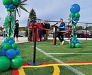 Jessica Schneider, Clover Hill District Supervisor, addresses the crowd at the ribbon-cutting ceremony for the four new lighted turf fields at River City Sportsplex.