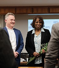 Outgoing 8th District School Board Member and Chairwoman, Dawn Page, (right) with Richmond Public School Superintendent Jason Kamras (left) hears gratitude from family members and former School Board colleagues for her 12 years of service.