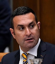 Jordan Acker, who is on the University of Michigan Board of Regents, is seen during a meeting in July 2022, in Ann Arbor, Michigan. Acker's home was vandalized on December 9.
Mandatory Credit:	Carlos Osorio/AP via CNN Newsource