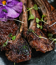 Lavish Eats HTX catering makes every gathering memorable with gourmet options like Baby Lamb Chops (savory crusted chops finished with herb butter and paired with homemade side dishes)./Photo: Visual Influence