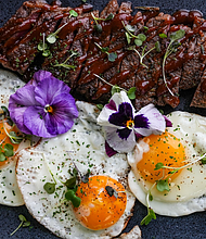 Lavish Eats HTX catering offers elegant holiday brunch dishes like Steak & Eggs/Photo: Visual Influence