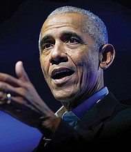 Former President Barack Obama speaks Dec. 5 at the Obama Foundation’s Democracy Forum in Chicago.