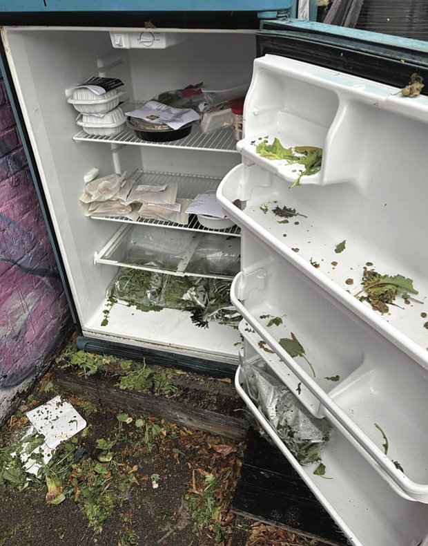 The disheveled fridge at Tequila & Deadlifts, a gym in Carytown, was posted by RVA Community Fridges on social media.