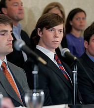 David Evans, left, Collin Finnerty, center, and Reade Seligmann, right, at a news conference after charges against them were dropped in 2007.
Mandatory Credit:	Chuck Burton/AP via CNN Newsource